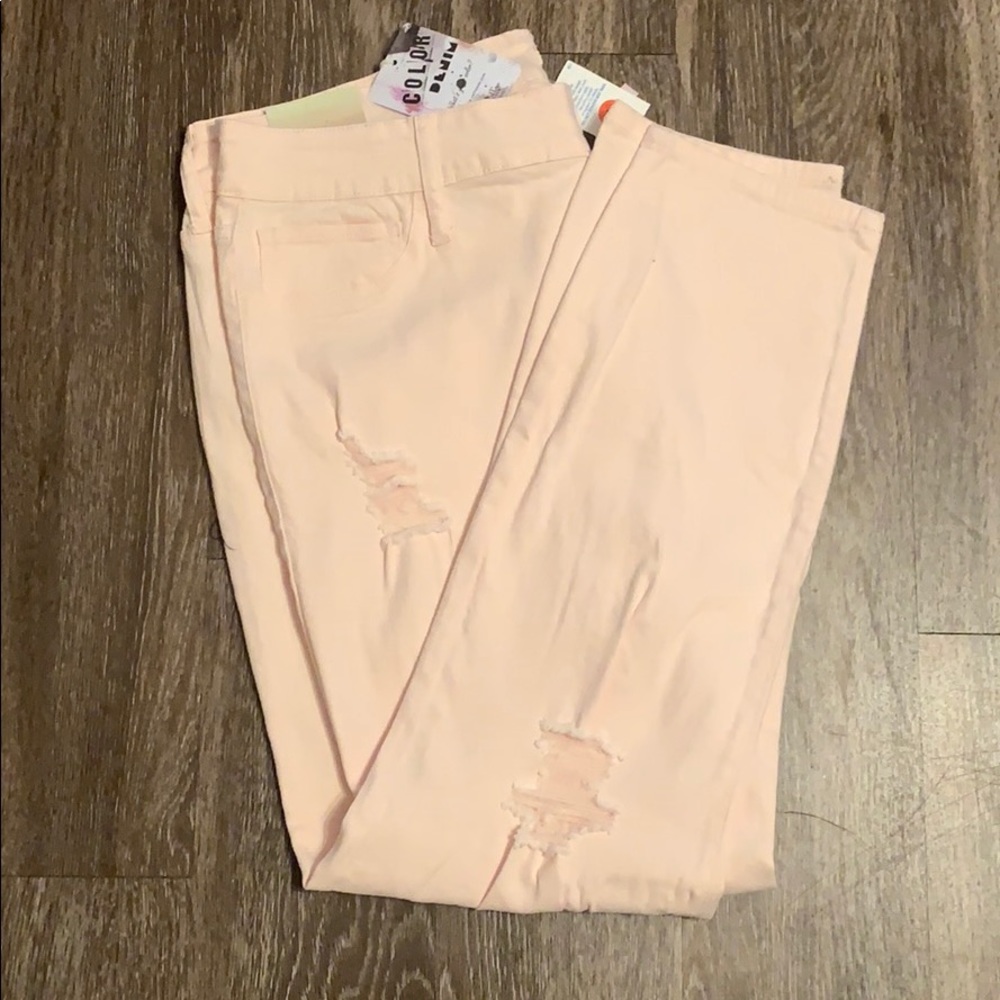 New with tags size 22 light pink/peach ripped jean